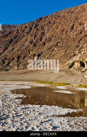 Salts and hills at Badwater Basin, 282 feet / 855 metres below sea level, Death Valley, California, USA. JMH5402 Stock Photo
