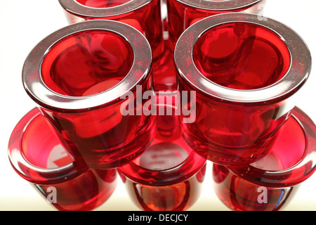 A pyramid of red tea light holders Stock Photo
