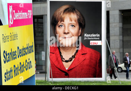 FDP has started a poster campaign to attract so-called 'second votes' (There are two votes in German elections: The first for a local candidate, the second for a party's state-wide list of candidates.) after the defeat in the Bavarian state elections in Berlin, Germany, 16 September 2013. An election poster with German chancellor Merkel is pictured on the right. Photo: WOLFGANG KUMM Stock Photo