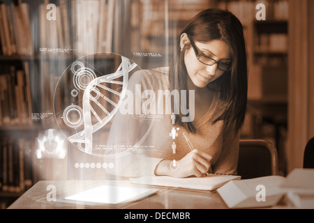 Serious mature student studying medicine on digital interface Stock Photo