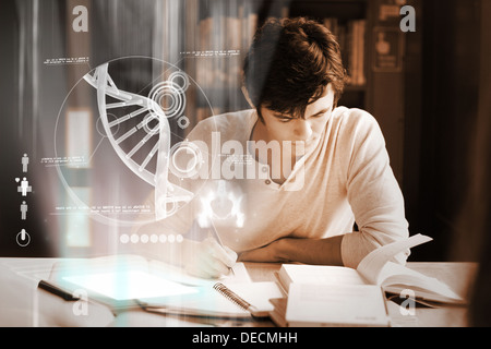 Concentrated college student analysing dna on digital interface Stock Photo
