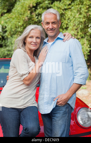 Smiling mature couple posing Stock Photo