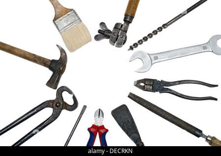 Old used vintage tools in a circle over a white background Stock Photo