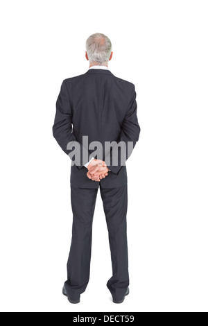 Rear view of serious businessman posing Stock Photo