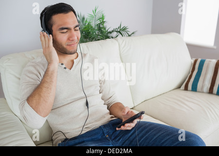 Relaxed handsome man listening to music Stock Photo