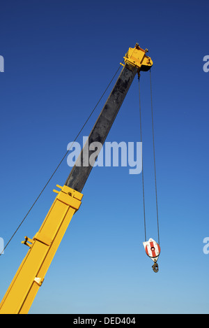 Construction crane hook, industrial machinery detail. Stock Photo