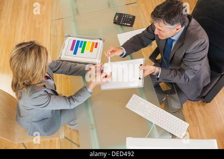 Two business people negociating in an office Stock Photo
