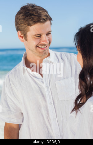 Man smiling at partner Stock Photo