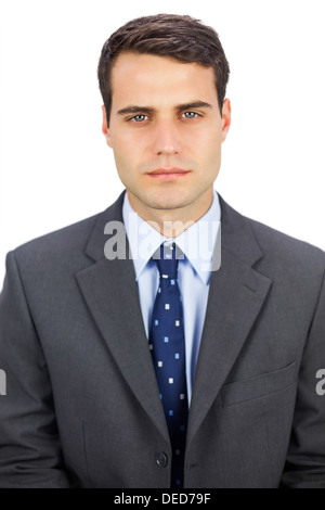 Serious businessman looking at camera Stock Photo
