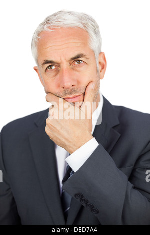 Thoughtful businessman looking away Stock Photo