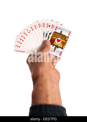 playing cards in hand as a background Stock Photo