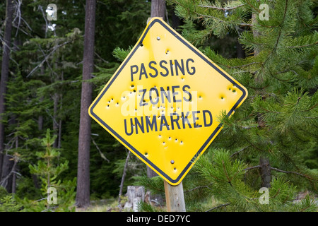 Bullet holes in road sign Crete Stock Photo - Alamy