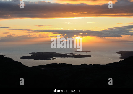 Sunset over the Summer Isles from Sgurr an Fhidhleir, Loch Broom, Scotland Stock Photo