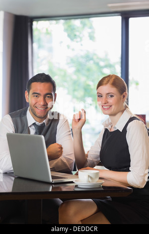 Business people working together in a cafe Stock Photo