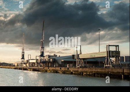 SOUTHAMPTON, HAMPSHIRE, UK - APRIL 26, 2009: Southampton Western Docks at Sunset with dramatic clouds Stock Photo