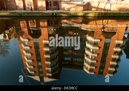 HM Customs and Excise buildings, Ralli Quays, reflected in the river Irwell, Salford, Manchester, England, UK Stock Photo