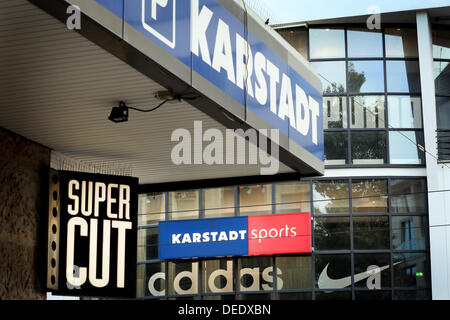 Duesseldorf, Germany. 17th Sep, 2013. View a Karstadt and a Karstadt Sports next to each other in Duesseldorf, Germany, 17 September 2013. Investor Berggruen give away his majority share in the Karstadt luxury and sports stores. Photo: MARTIN GERTEN/dpa/Alamy Live News Stock Photo