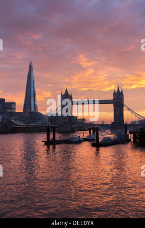 The Shard and Tower Bridge on the River Thames at sunset, London, England, United Kingdom, Europe Stock Photo