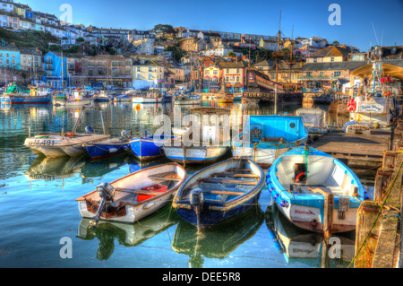 Brixham harbour Devon with boats blue sky and houses on hill in HDR Stock Photo