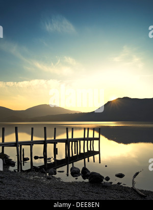 Sunrise over Dertwentwater, English Lake District, with silhouette of jetty Stock Photo