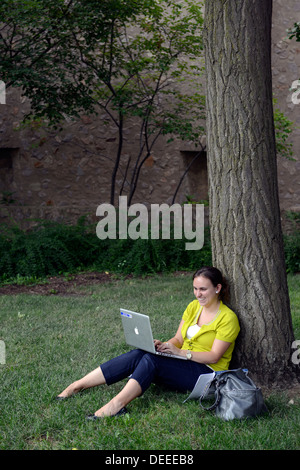 Yale University students works on laptop to study for science test. Stock Photo
