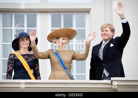 The Hague, The Netherlands. 17th Sep, 2013. Dutch King Willem-Alexander, Queen Maxima (C) and Princess Laurentien wave to the crowd from the balcony of the Palace Noordeinde in The Hague, The Netherlands, 17 September 2013, on Prinsjesdag (Prince's Day), the traditional opening of the Dutch parliamentary year. It is the first time that the new king delivers a Speech from the Throne in the Knights' Hall. Photo: Patrick van Katwijk / NETHERLANDS AND FRANCE OUT/dpa/Alamy Live News Stock Photo