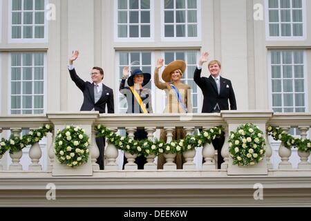 The Hague, The Netherlands. 17th Sep, 2013. Dutch King Willem-Alexander (R), Queen Maxima (2nd R), Prince Constantijn and Princess Laurentien seen on the balcony of the Palace Noordeinde in The Hague, The Netherlands, 17 September 2013, on Prinsjesdag (Prince's Day), the traditional opening of the Dutch parliamentary year. It is the first time that the new king delivers a Speech from the Throne in the Knights' Hall. Photo: Patrick van Katwijk / NETHERLANDS AND FRANCE OUT/dpa/Alamy Live News Stock Photo