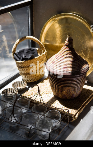 Mint tea glasses on windowsill of Moroccan kitchen Stock Photo