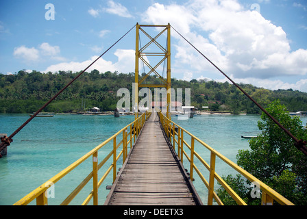 An old bridge over the ocean in Nusa Lembongan, Bali, Indonesia Stock Photo