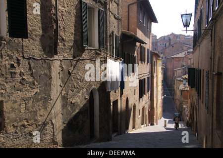 Alley in the old town of Siena in Tuscany Stock Photo