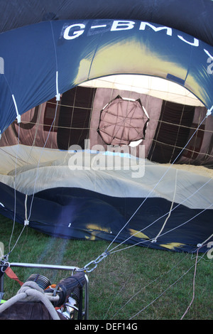 Flame from burner inflating hot air balloon Stock Photo