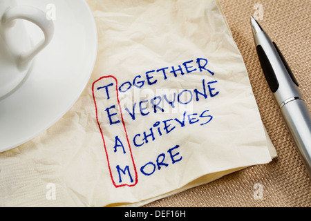 TEAM acronym (together everyone achieves more), teamwork motivation concept - a napkin doodle Stock Photo