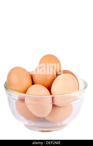 fresh organic eggs in bowl isolated on a white background Stock Photo