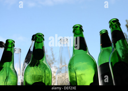 Empty green and white bottles waiting to be recycled Stock Photo