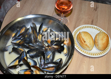 Mussels and bread supper Stock Photo