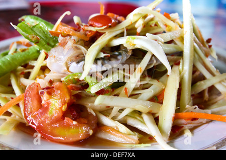 Thai papaya salad also known as Som Tum from Thailand. Stock Photo