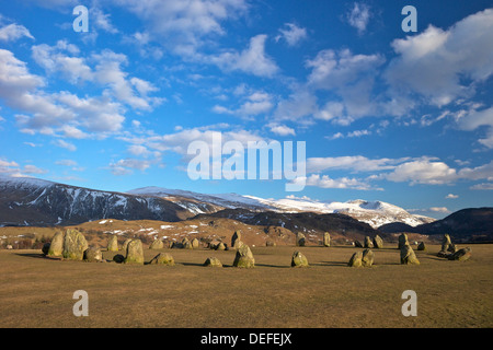 Castelrigg Megalithic Stone Circle in winter with Helvellyn range behind, Lake District National Park, Cumbria, England, UK Stock Photo