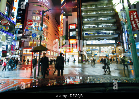 Neon lights on a rainy evening, Shinjuku, Tokyo, Honshu, Japan, Asia Stock Photo