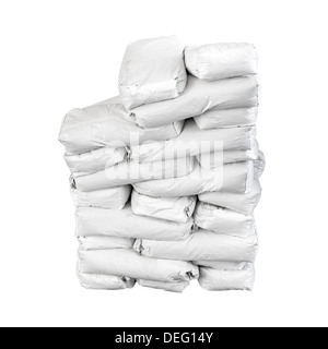 Stack of paper bags with cement isolated on white Stock Photo