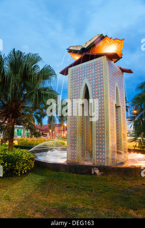 Central park and museum Negeri Kelantan (State Museum) illuminated at dusk, Kota Bharu, Kelantan State, Malaysia, Southeast Asia Stock Photo