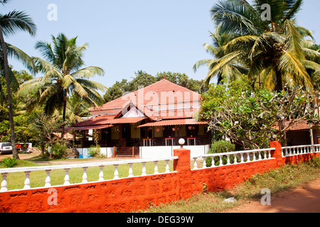 Building surrounded by palm trees, Patrick Spiritual Healer, Nani's Rani's, Baga, Bardez, North Goa, Goa, India Stock Photo