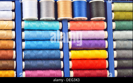 colored spools of threads shoot in studio Stock Photo