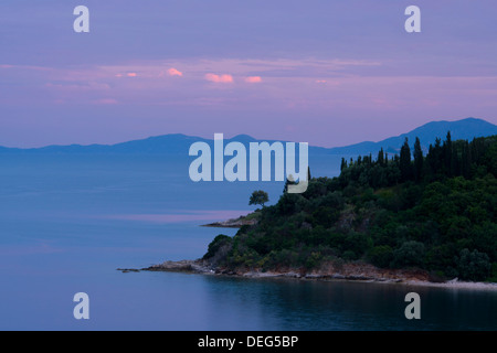 Sunset on the northeast coast of Corfu near Agios Stefanos, Corfu, Ionian Islands, Greek Islands, Greece, Europe Stock Photo