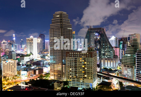 High rise buildings of Bangkok at night from Rembrandt Hotel and Towers, Sukhumvit 18, Bangkok, Thailand, Southeast Asia, Asia Stock Photo