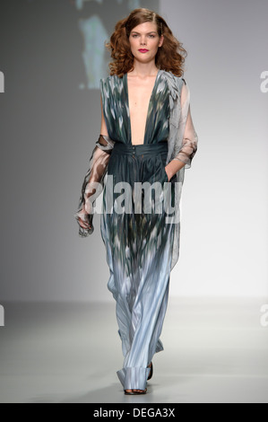 A model wears a design created by Maria Grachvogel during London Fashion Week Spring/Summer 2014. Stock Photo