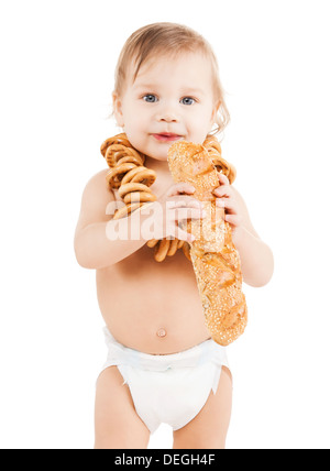 cute todler eating long bread Stock Photo