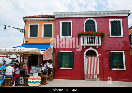 People at a restaurant, Burano, Venetian Lagoon, Venice, Veneto, Italy Stock Photo