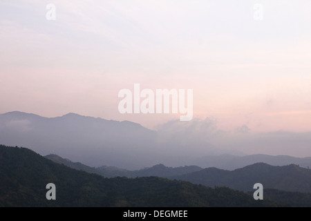 Morning Mist at Tropical Mountain Range, Thailand. Stock Photo