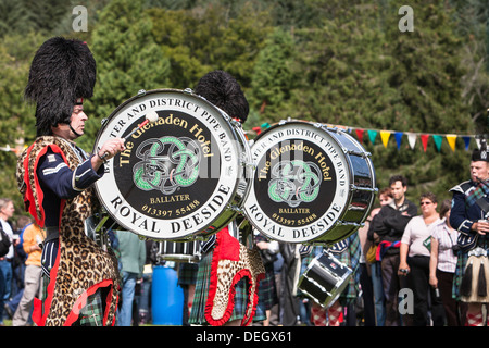 Drummers in Scottish marching band at the Lonach highland games at Strathdon in Aberdeenshire,Scotland Stock Photo