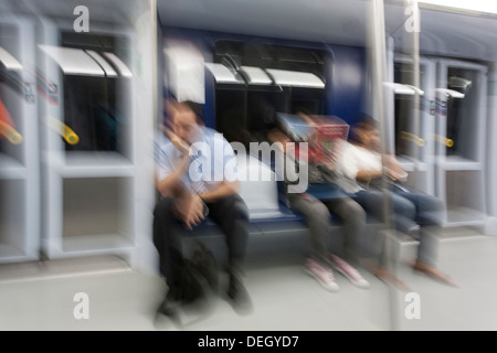 Commuters on Line 7 of the Madrid Metro with motion blur - Peñagrande, Fuencarral-El Pardo, Madrid, Community of Madrid, Spain Stock Photo